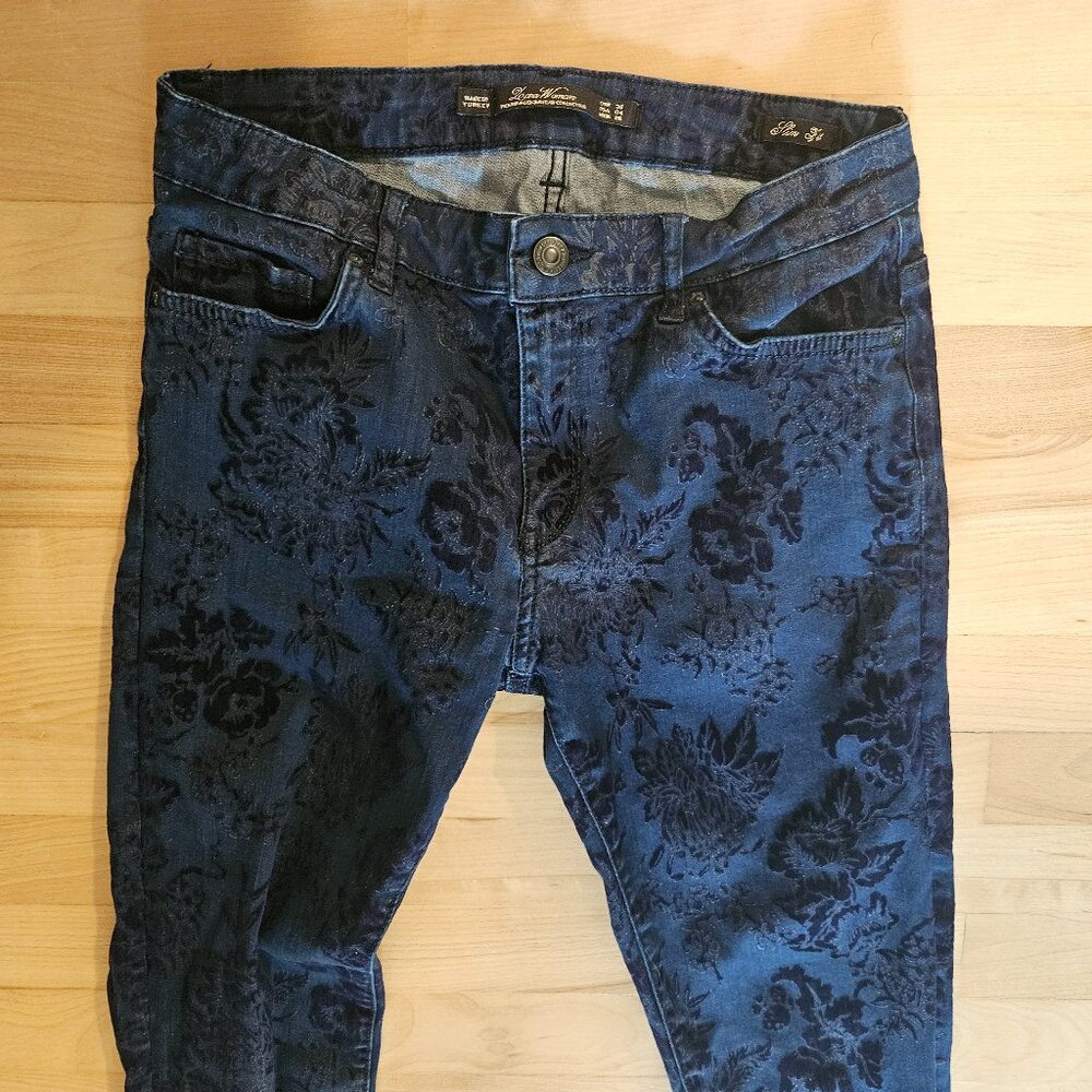 3/15$ navy jeans with dark floral pattern